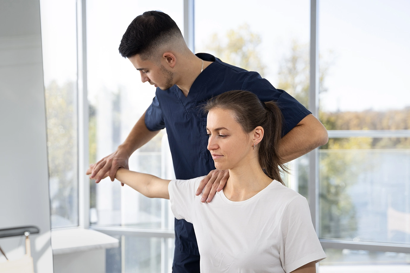 Best Chiropractor Near Me – Blair Chiropractic & Massage Therapy in Barrie helping patient with shoulder and spine adjustment.